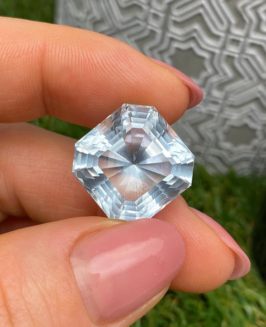 Aquamarine natural Loose gemstone 28.20 ct., Square mixed cut, Origin Nigeria, Certificate IGI